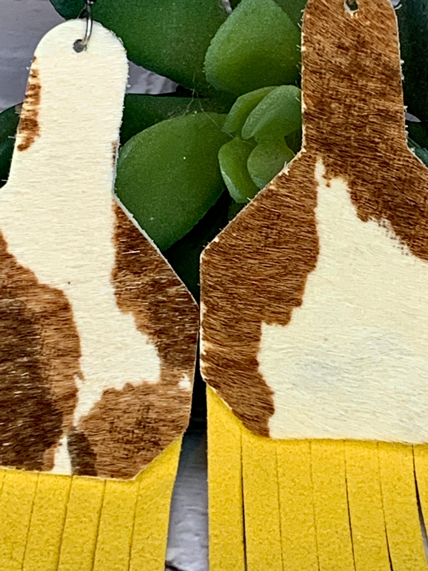 BROWN COW TASSEL EARRINGS