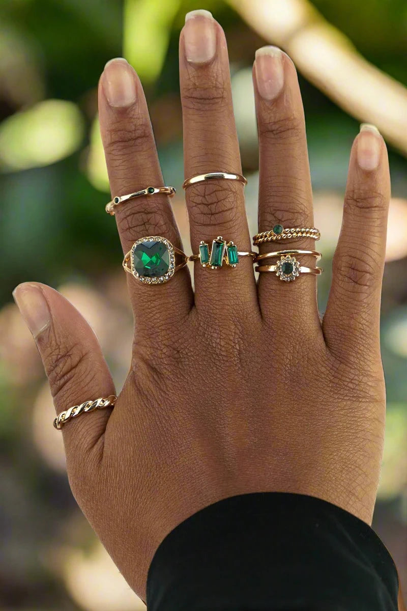CLORIS CRYSTAL AND GOLDTONE 9 RING SET