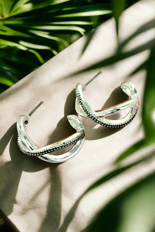 SILVERTONE CRISS-CROSS HOOP EARRINGS